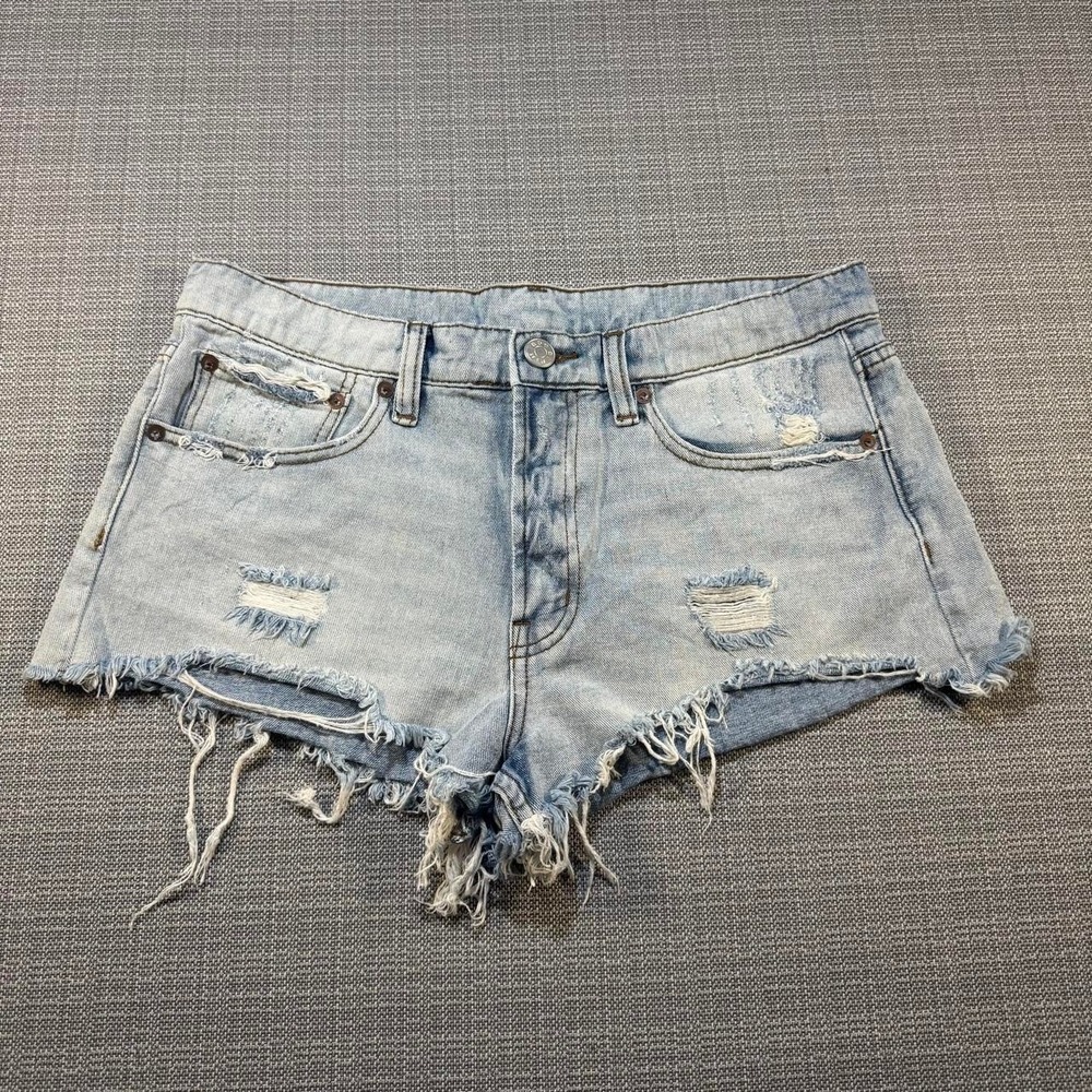BDG Distressed blue denim shorts with frayed hem